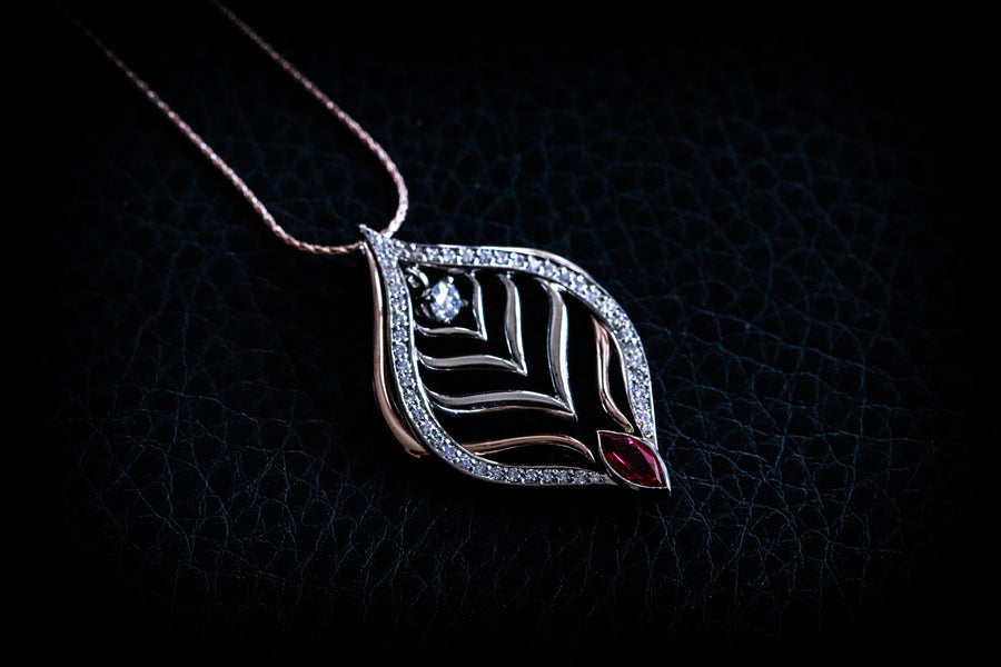 18k Rose gold and Platinum Diamond necklace featuring a Burma Ruby.